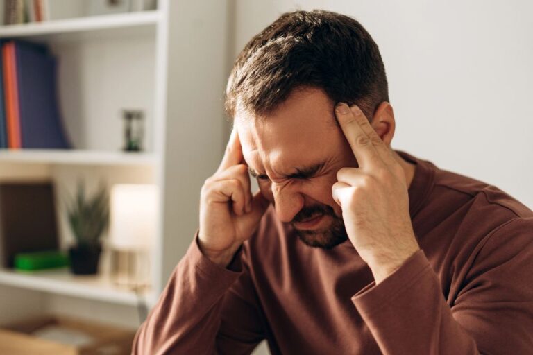 a man having bad migraine
