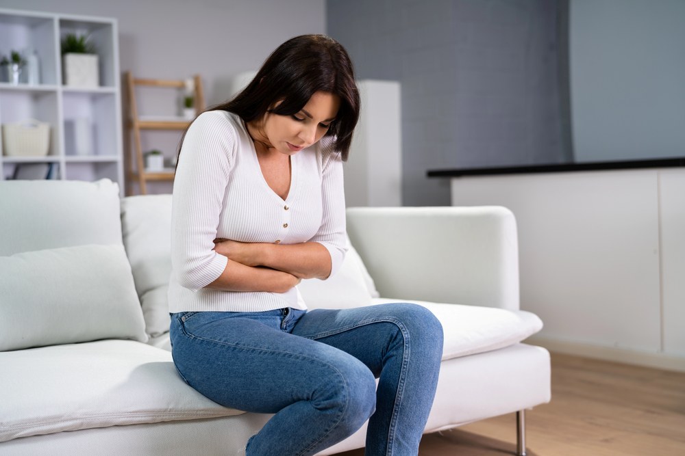 a woman feeling uncomfortable from having uti